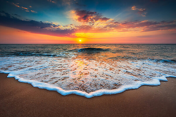 Coucher de soleil sur une plage Coucher de soleil sur une plage