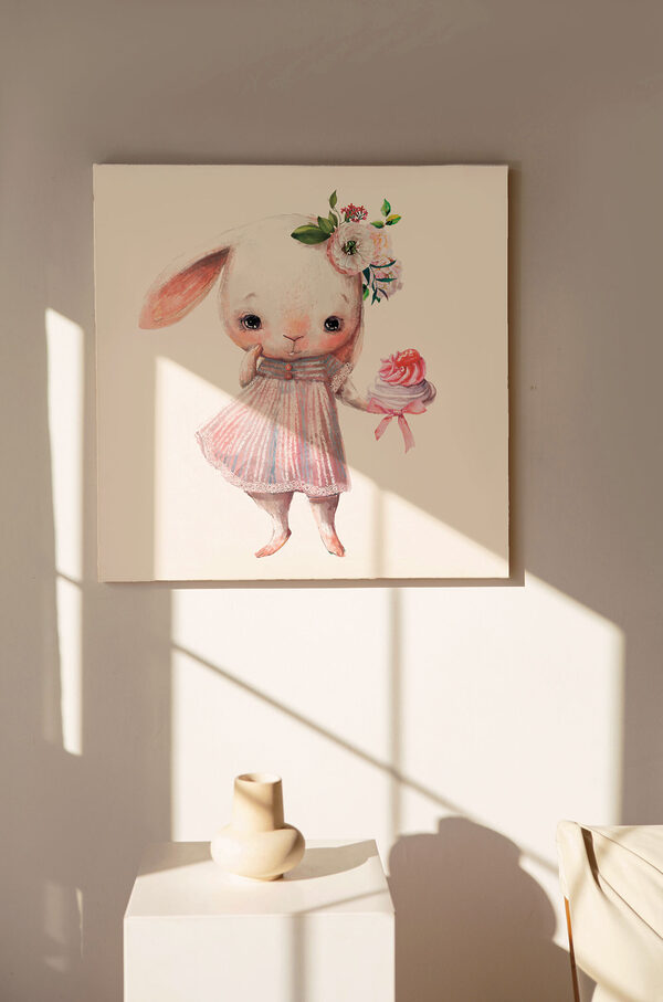 Dessin humoristique d'un lapin tenant un petit gâteau Dessin humoristique d'un lapin tenant un petit gâteau