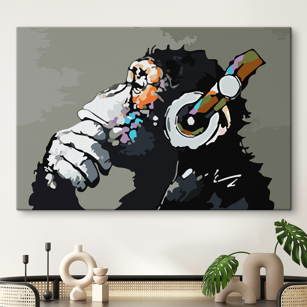 A cartoon of a monkey holding a headphone