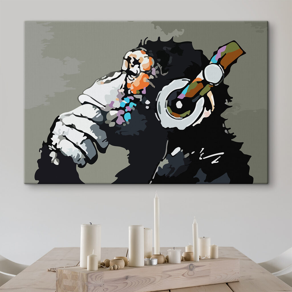 A cartoon of a monkey holding a headphone