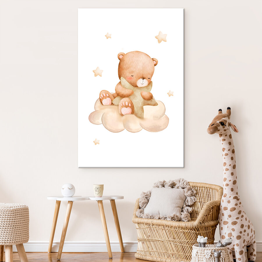 Un ours en peluche assis sur un nuage