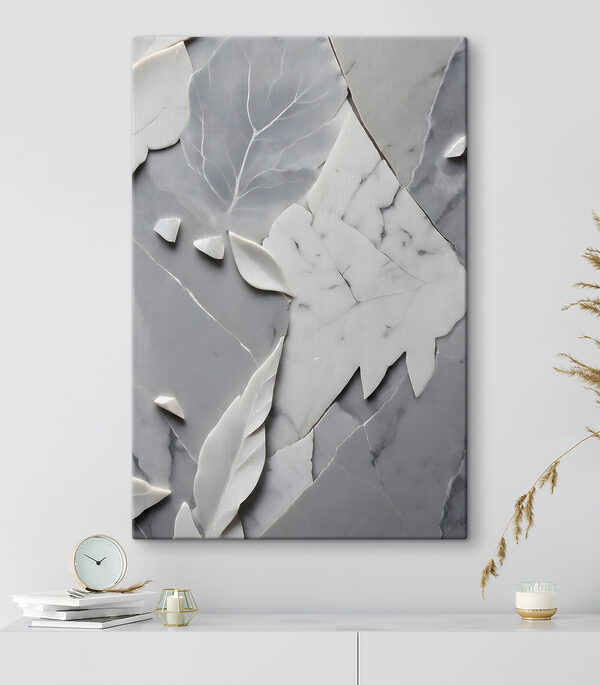 Une surface en marbre blanc et gris avec des feuilles Une surface en marbre blanc et gris avec des feuilles