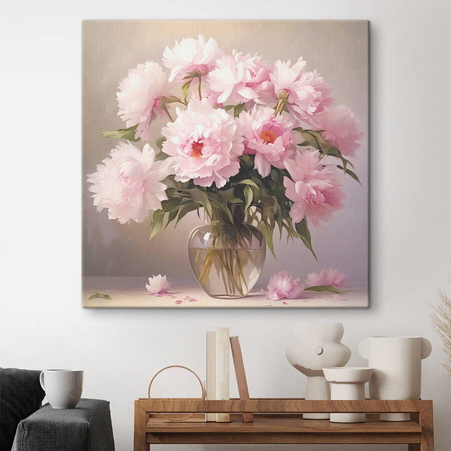 Un vase de fleurs roses