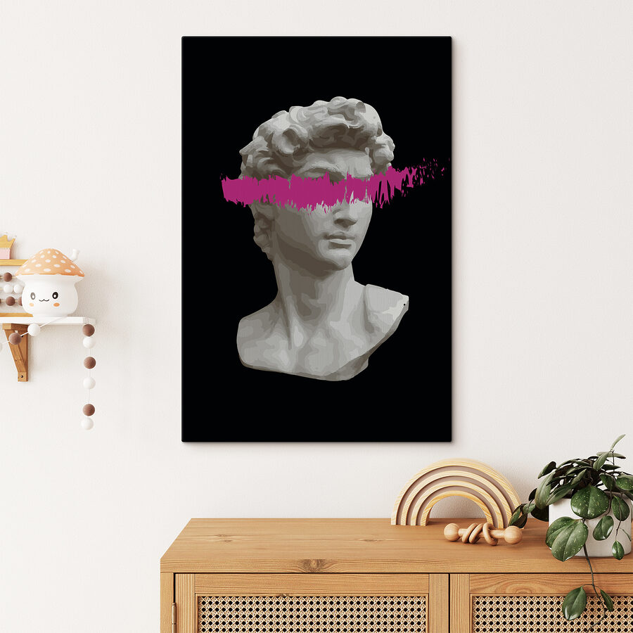 Une statue d'un homme avec une ligne rose Une statue d'un homme avec une ligne rose