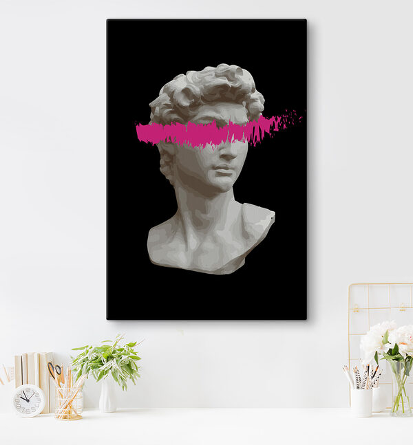 Une statue d'un homme avec une ligne rose Une statue d'un homme avec une ligne rose