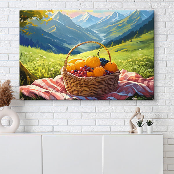 Une corbeille de fruits sur une couverture dans un champ herbeux Une corbeille de fruits sur une couverture dans un champ herbeux