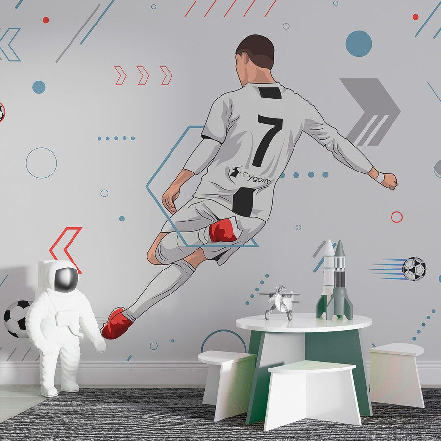 Un joueur de football bottant un ballon