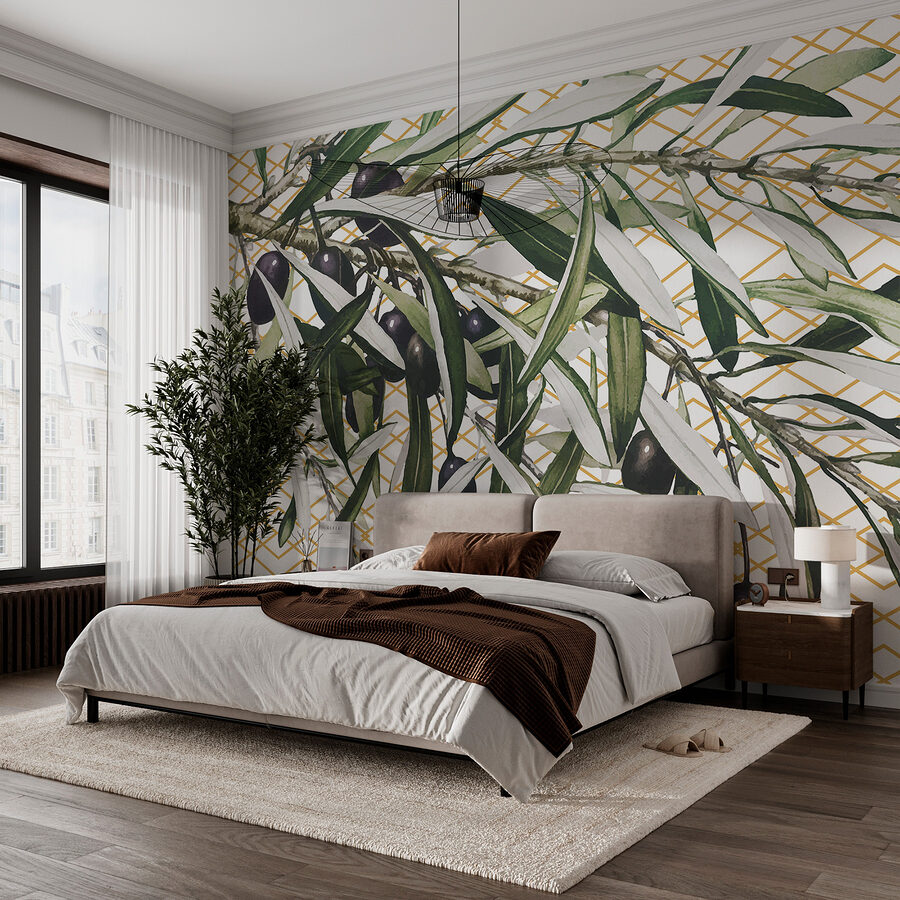 Une branche avec des olives noires et des feuilles Une branche avec des olives noires et des feuilles