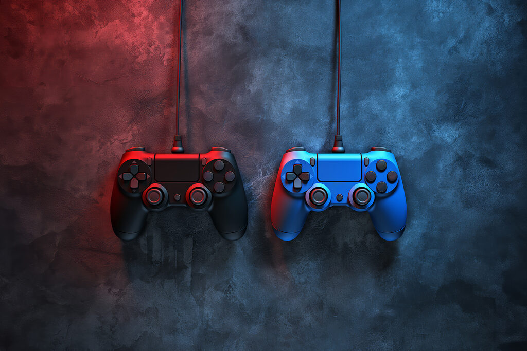 Une manette de jeu vidéo bleue et rouge Une manette de jeu vidéo bleue et rouge