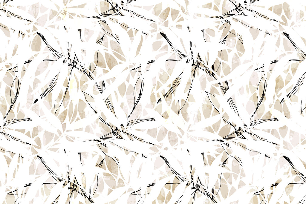 Un motif de feuilles sur une surface blanche Un motif de feuilles sur une surface blanche