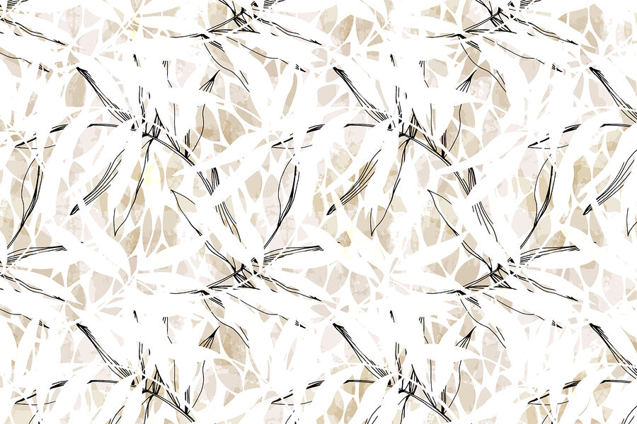Un motif de feuilles sur une surface blanche