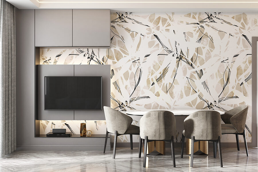 Un motif de feuilles sur une surface blanche