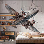 Papier peint Un avion qui vole dans les airs