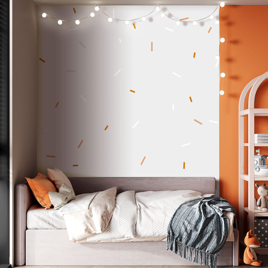 Un saupoudrage blanc et orange sur fond gris