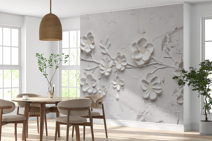 Papier peint Une fleur blanche sur une surface blanche