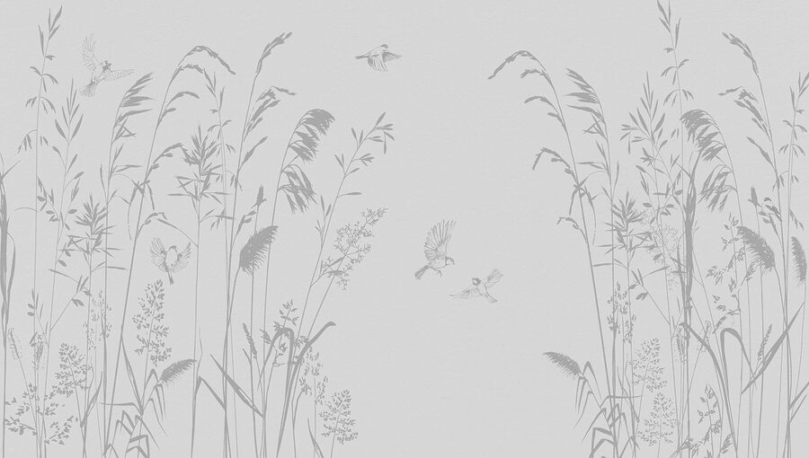 Oiseaux volant au-dessus des hautes herbes