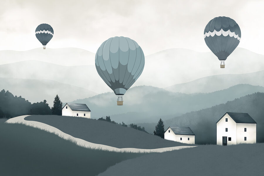 Groupe de montgolfières survolant un village Groupe de montgolfières survolant un village