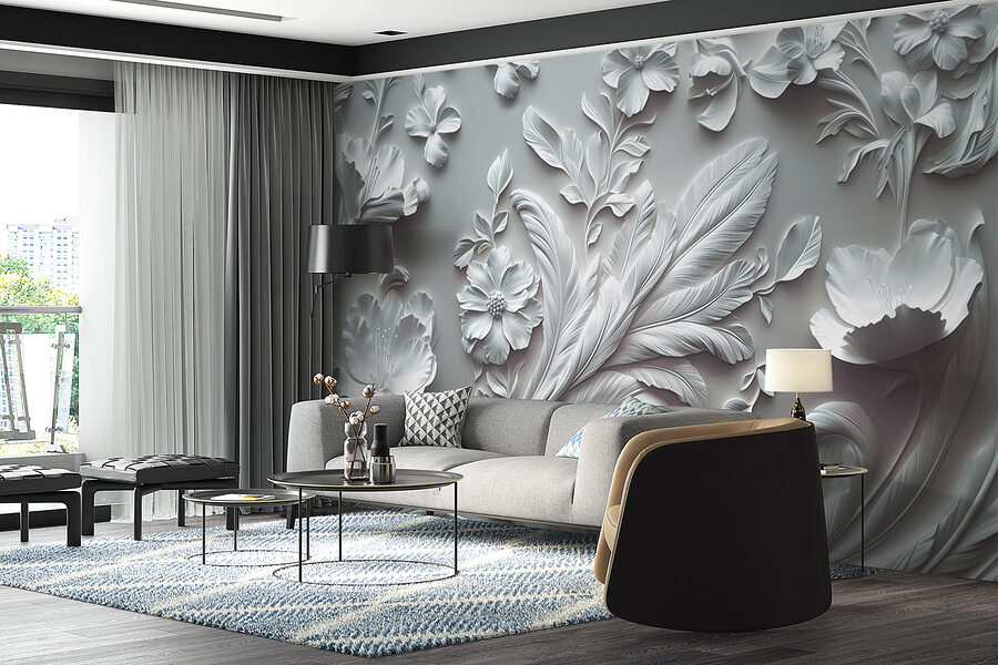 Mur blanc avec fleurs et feuilles
