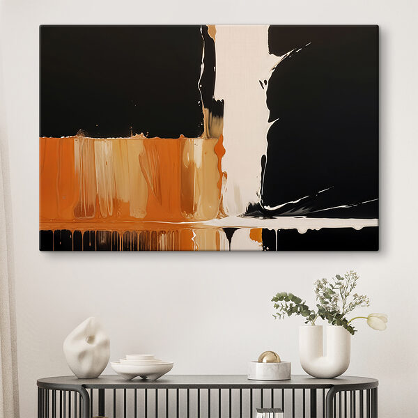 Peinture blanche et orange dégoulinant sur une surface noire Peinture blanche et orange dégoulinant sur une surface noire