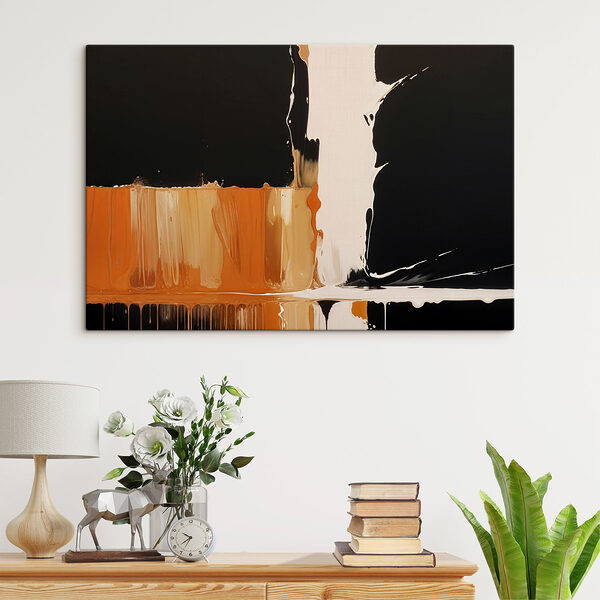 Peinture blanche et orange dégoulinant sur une surface noire Peinture blanche et orange dégoulinant sur une surface noire