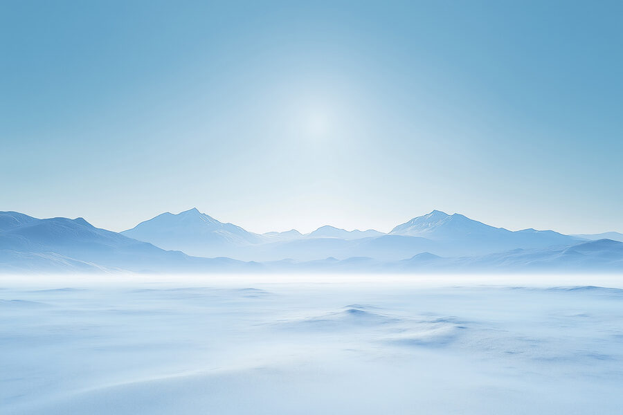 Paysage enneigé avec des montagnes au loin Paysage enneigé avec des montagnes au loin