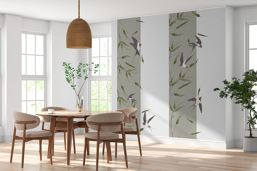 Papier peint avec des oiseaux volant sur une branche