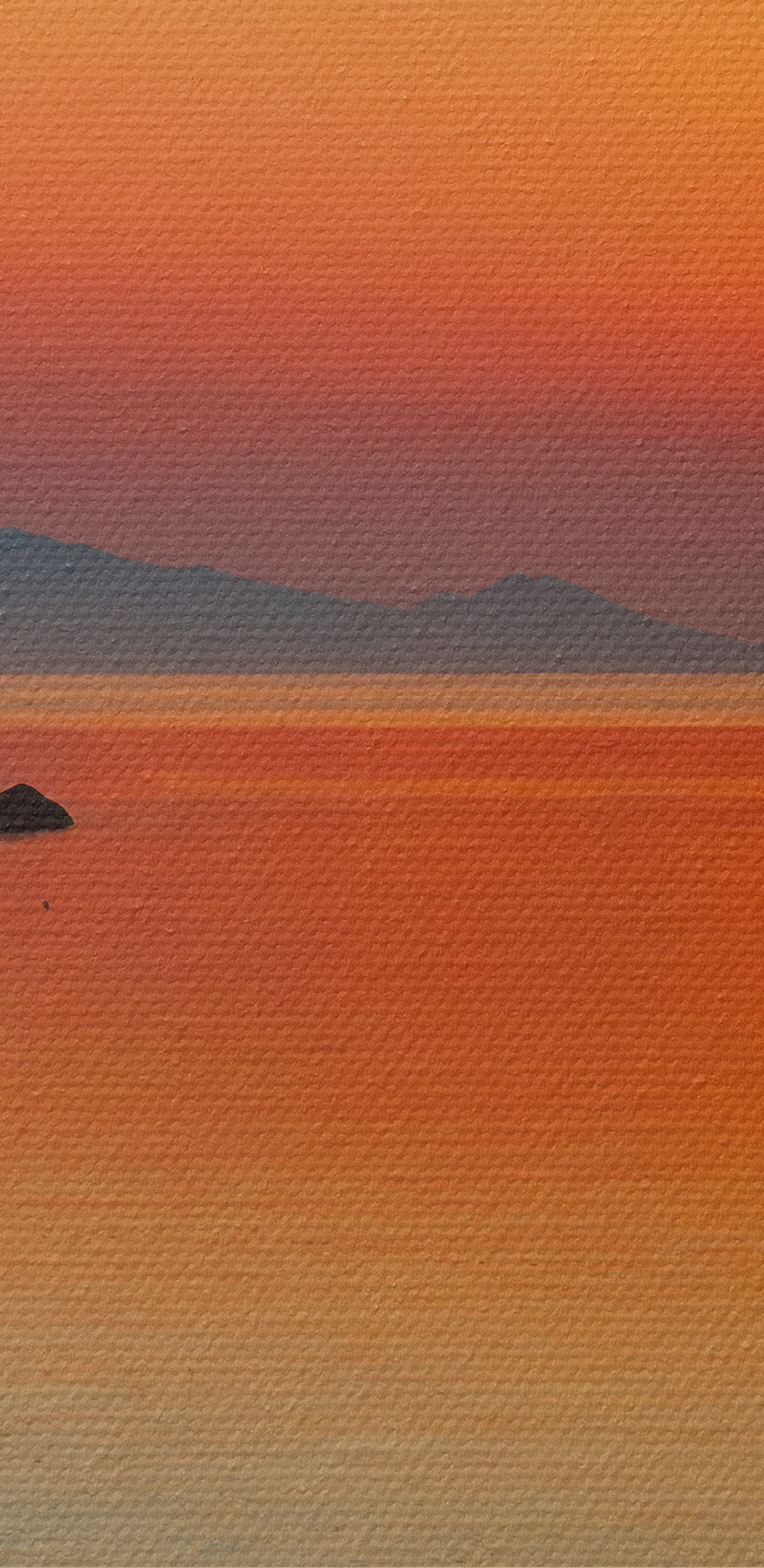 Coucher de soleil sur une étendue d'eau