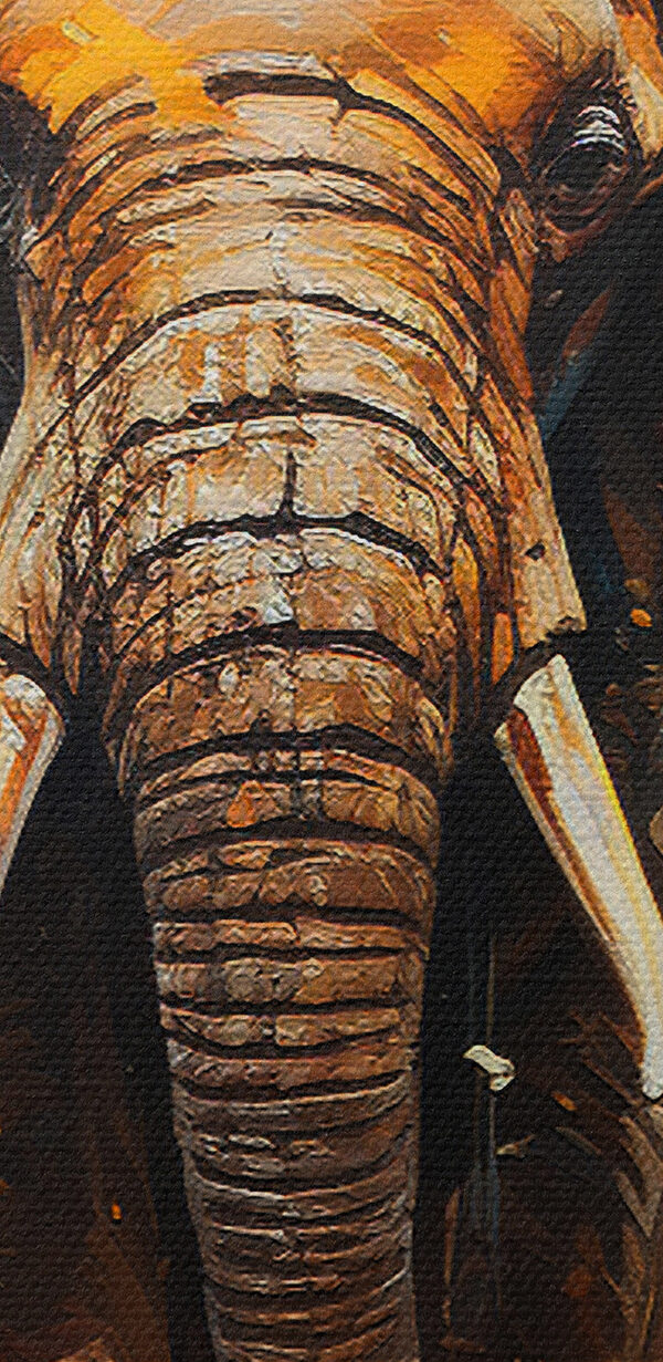 Un éléphant avec des défenses et de la terre Un éléphant avec des défenses et de la terre