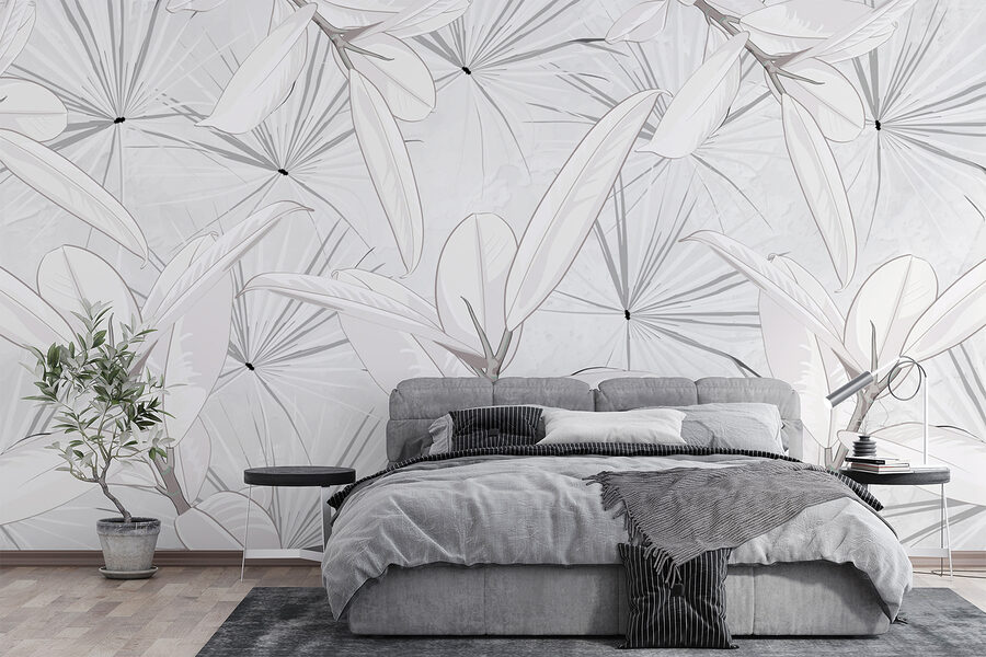 Feuilles blanches sur fond gris