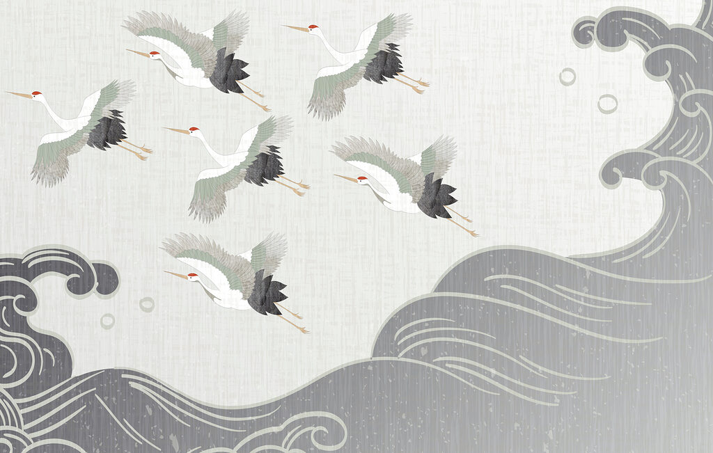 Groupe d'oiseaux volant au-dessus d'une vague Groupe d'oiseaux volant au-dessus d'une vague