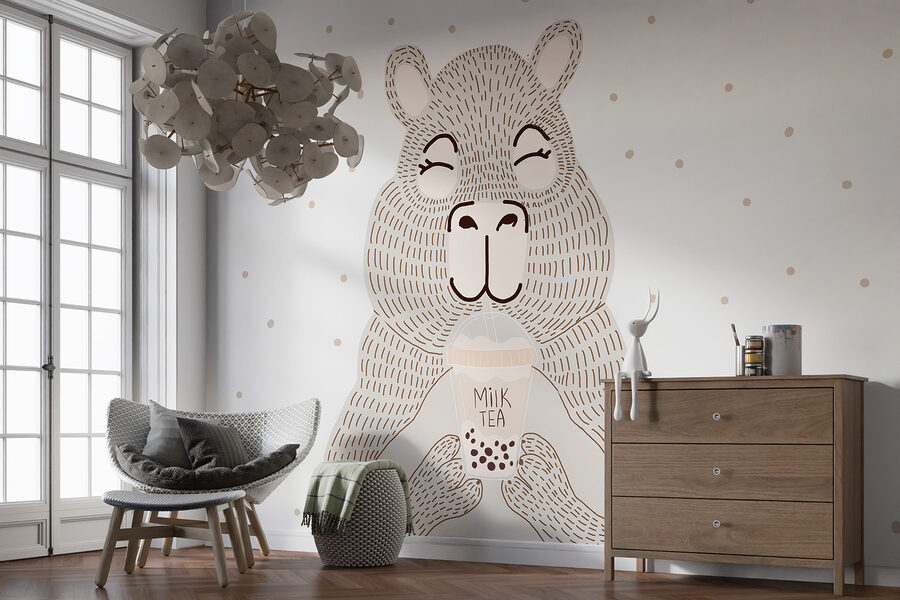 Caricature d'un ours tenant un thé à bulles