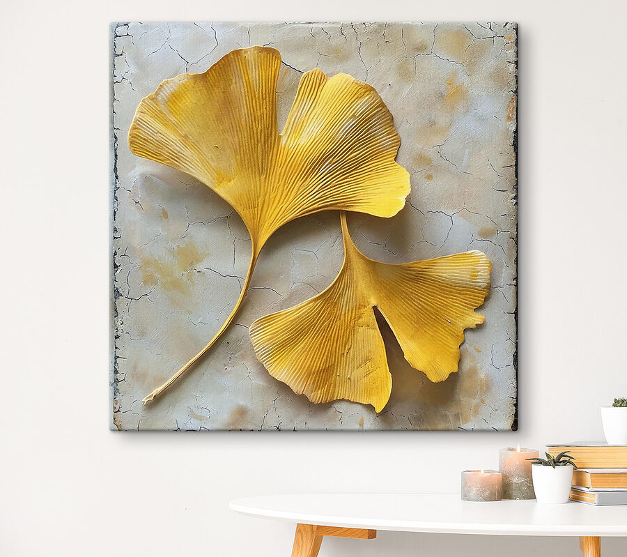 Feuilles jaunes sur une surface blanche