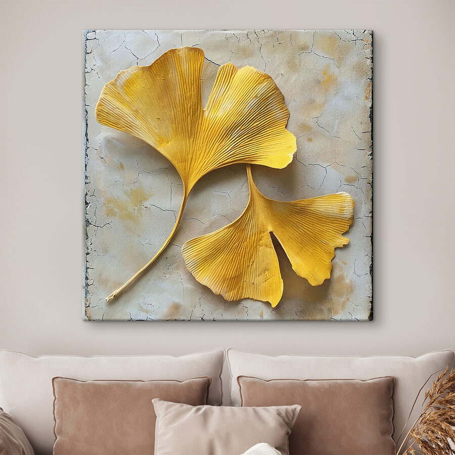 Feuilles jaunes sur une surface blanche