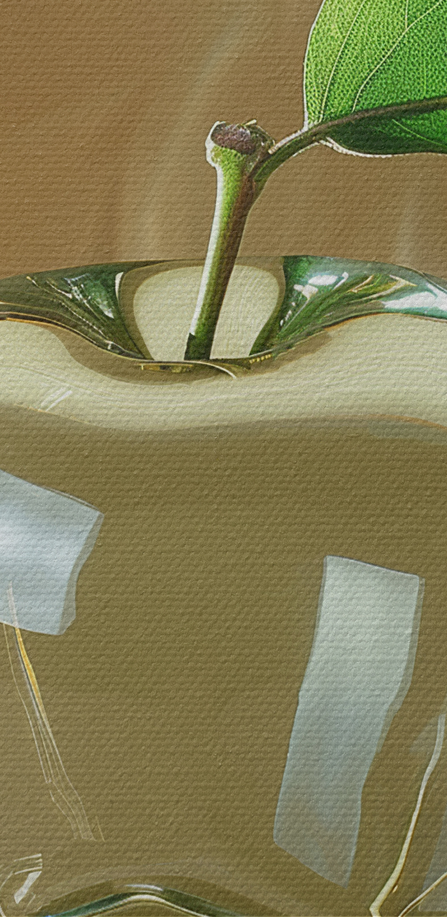 Pomme en verre avec une feuille dessus