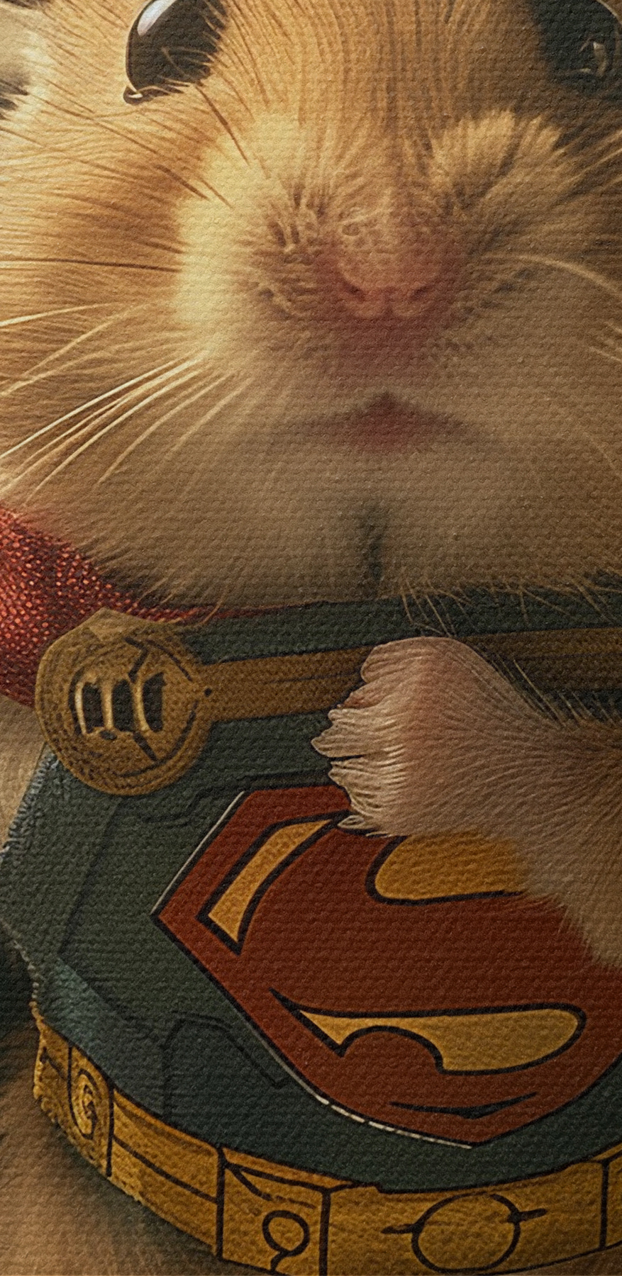 Hamster portant une cape et tenant un marteau