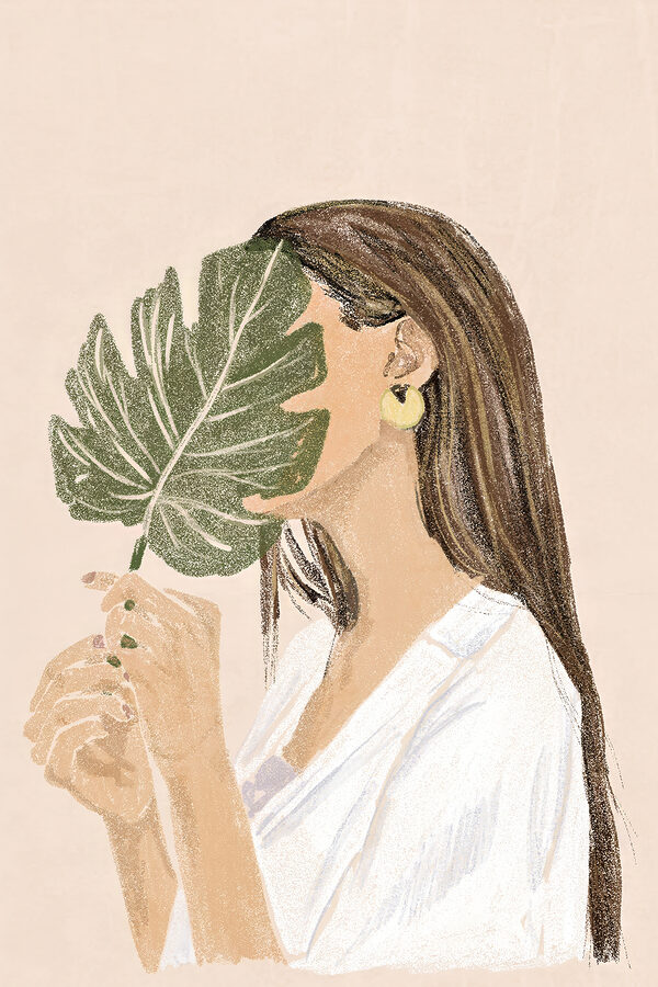 Femme tenant une feuille Femme tenant une feuille