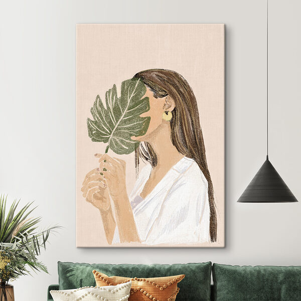 Femme tenant une feuille Femme tenant une feuille