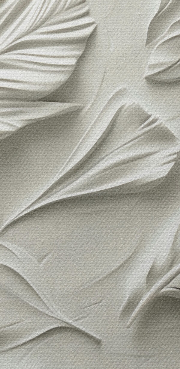Sculpture de plumes blanches sur un mur Sculpture de plumes blanches sur un mur