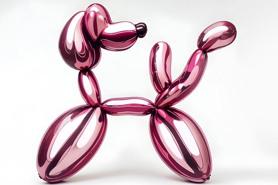 Chien en ballons de baudruche rose