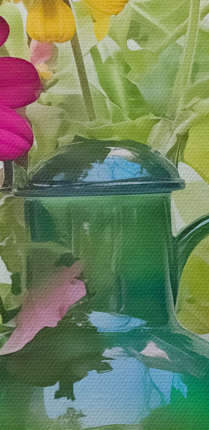 Théière verte avec fleurs colorées