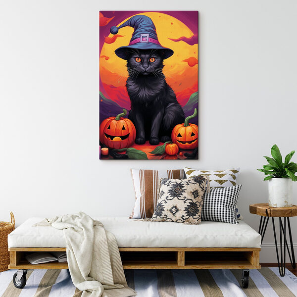 Chat noir portant un chapeau et des citrouilles Chat noir portant un chapeau et des citrouilles