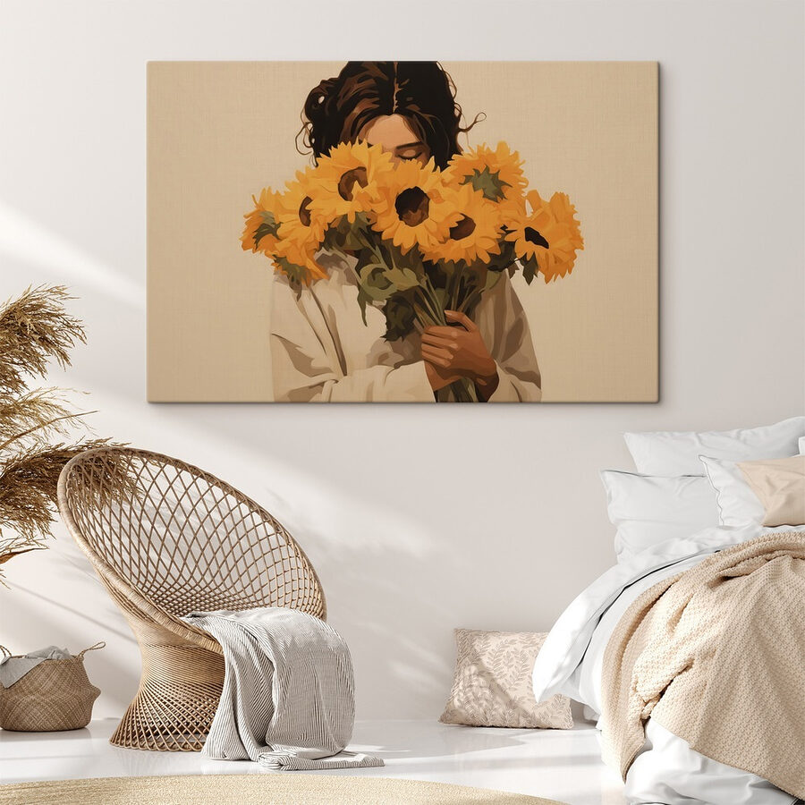 Femme tenant un bouquet de tournesols