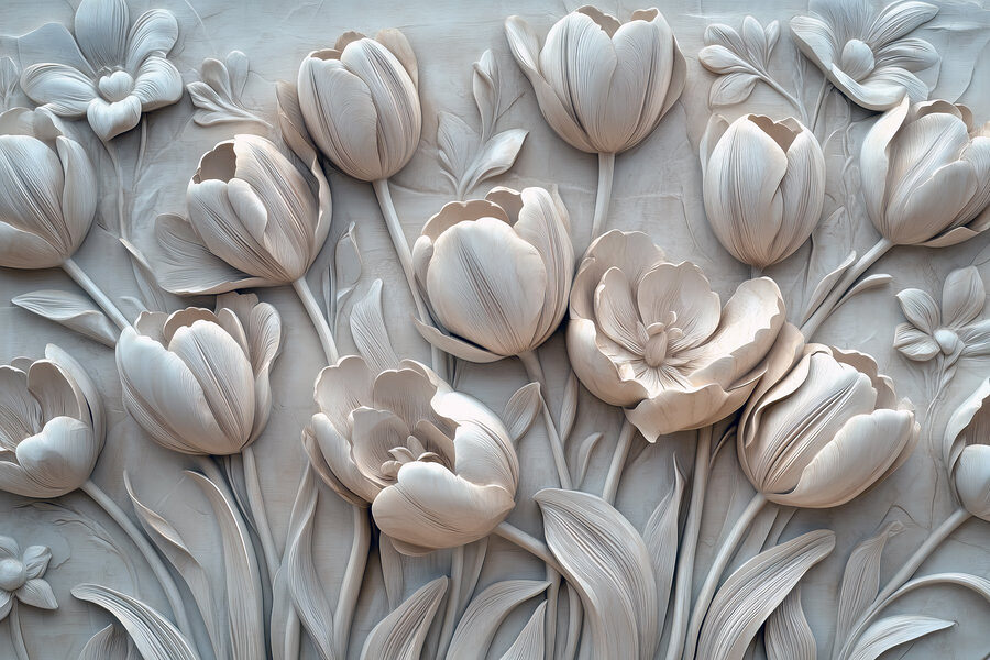 Sculpture de fleurs blanches sur un mur Sculpture de fleurs blanches sur un mur