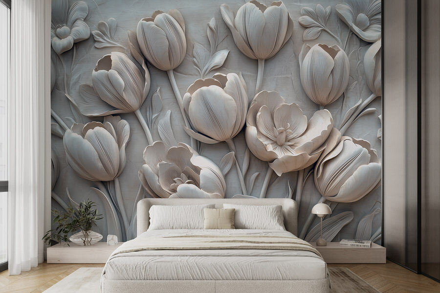 Sculpture de fleurs blanches sur un mur Sculpture de fleurs blanches sur un mur