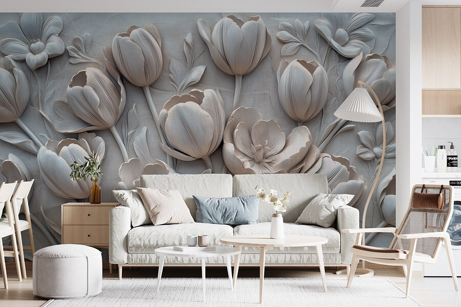 Sculpture de fleurs blanches sur un mur Sculpture de fleurs blanches sur un mur