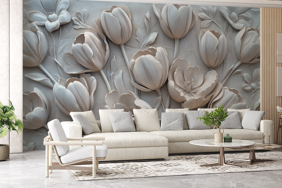 Sculpture de fleurs blanches sur un mur Sculpture de fleurs blanches sur un mur