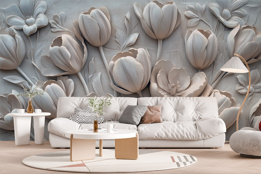 Sculpture de fleurs blanches sur un mur Sculpture de fleurs blanches sur un mur