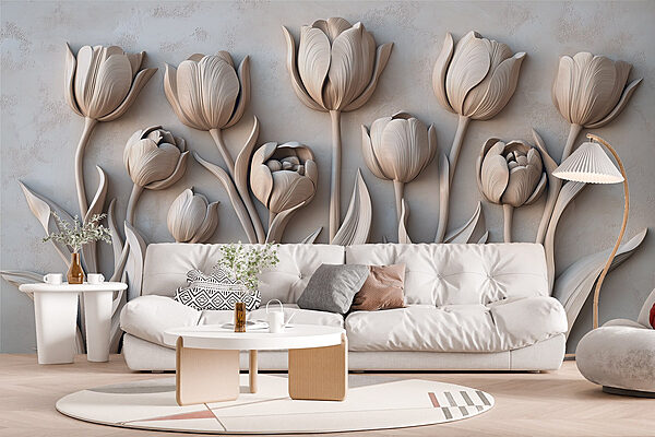 Sculpture de fleurs blanches sur un mur Sculpture de fleurs blanches sur un mur