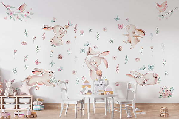 Groupe de lapins avec des fleurs et des papillons Groupe de lapins avec des fleurs et des papillons