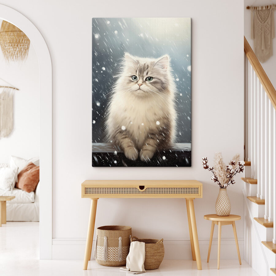 Chat assis dans la neige